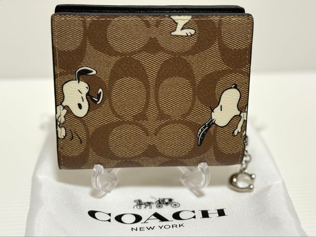 COACH × PEANUTS（スヌーピー）二つ折り財布 型番：C4591