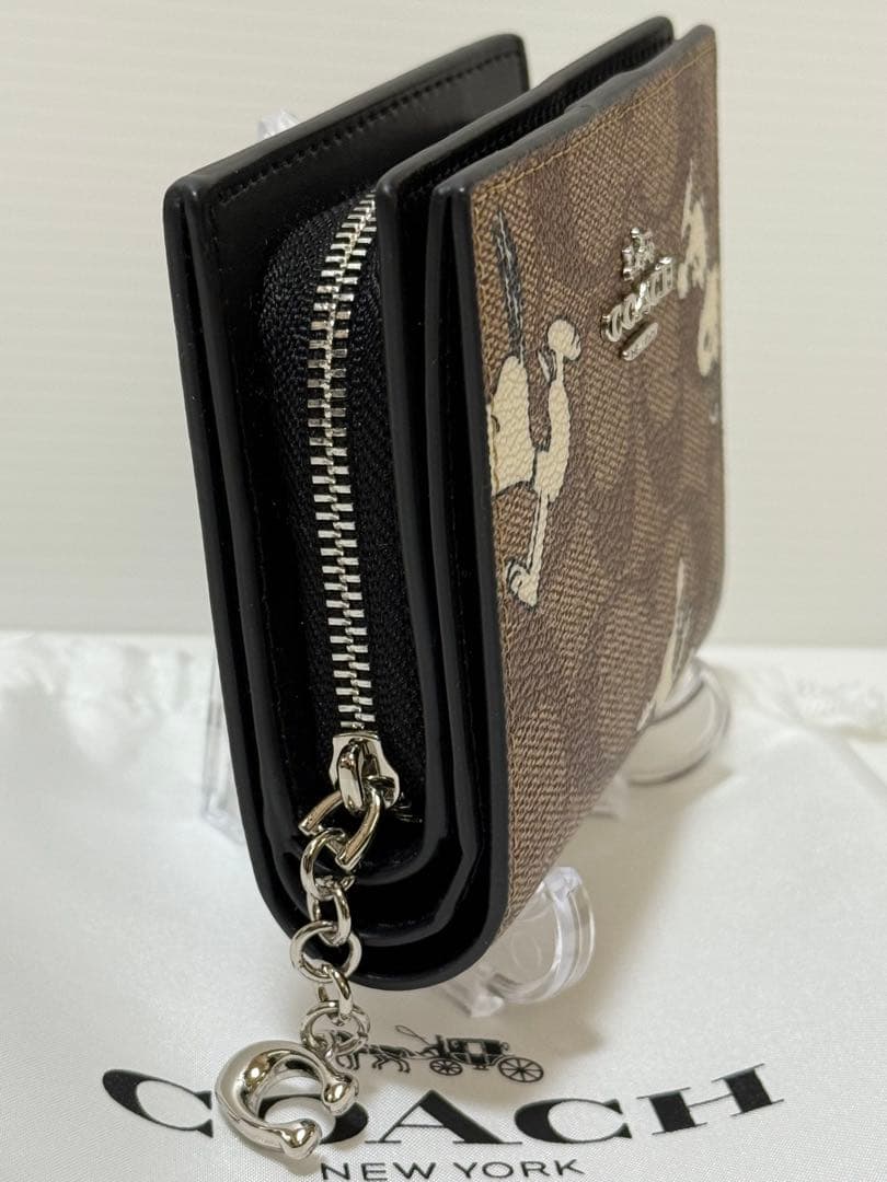 COACH × PEANUTS（スヌーピー）二つ折り財布 型番：C4591