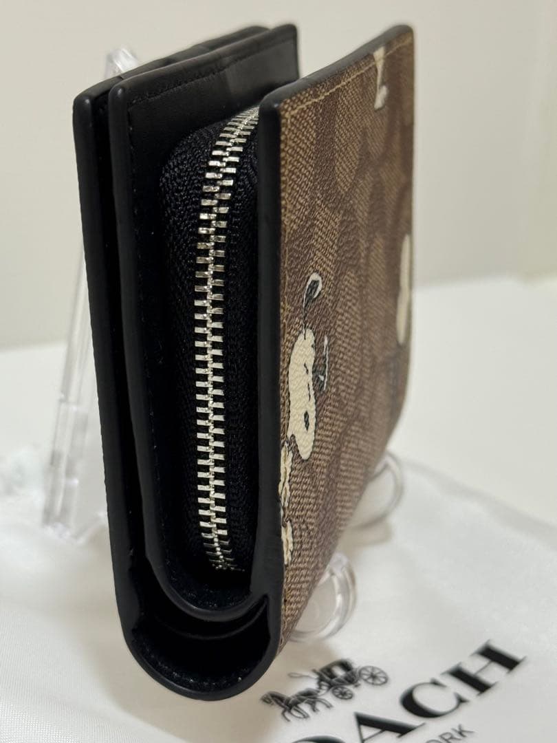 COACH × PEANUTS（スヌーピー）二つ折り財布 型番：C4591