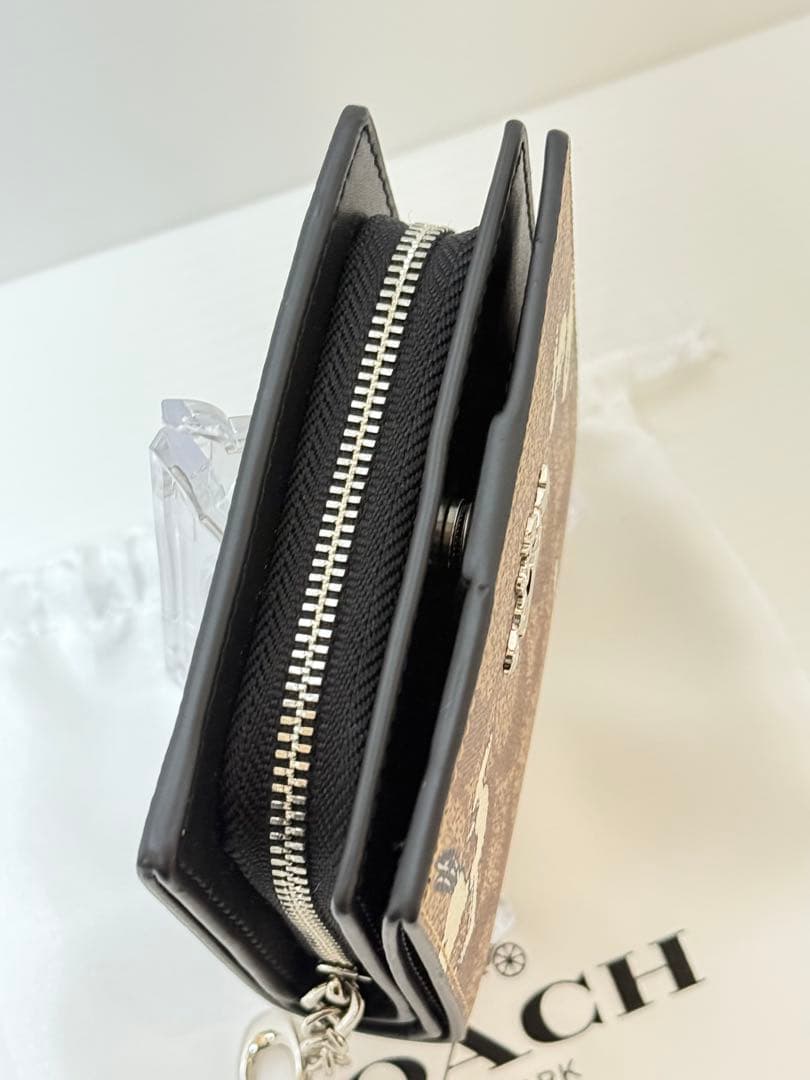 COACH × PEANUTS（スヌーピー）二つ折り財布 型番：C4591