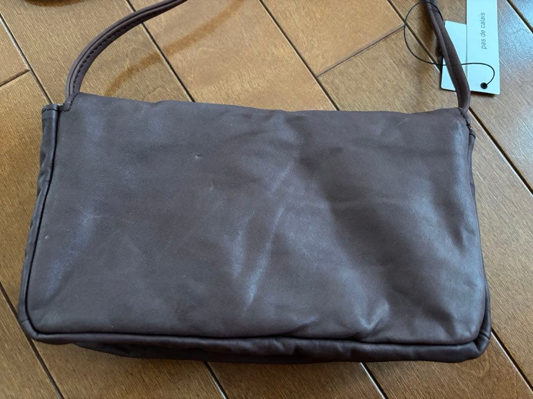 パドカレ　ハンドムラ染めレザーポーチバッグ