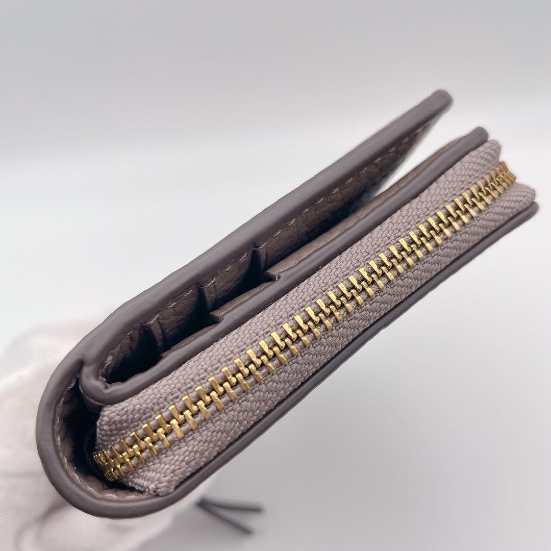 美品✨Tory Burch トリーバーチ 二つ折り財布 グレージュ 金ロゴ