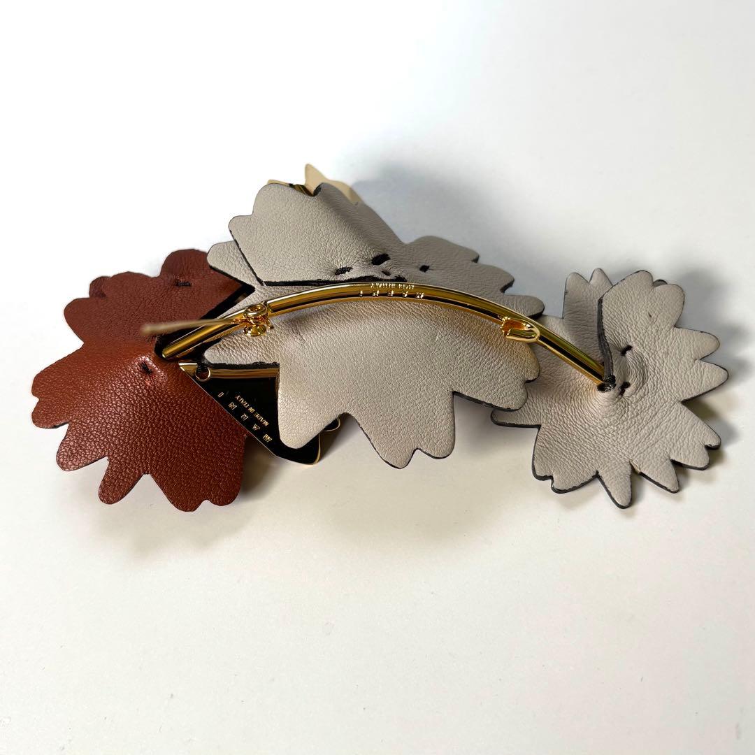 超美品✨MARNI ブローチ 保存袋付き　花　レザー&メタル　ゴールド