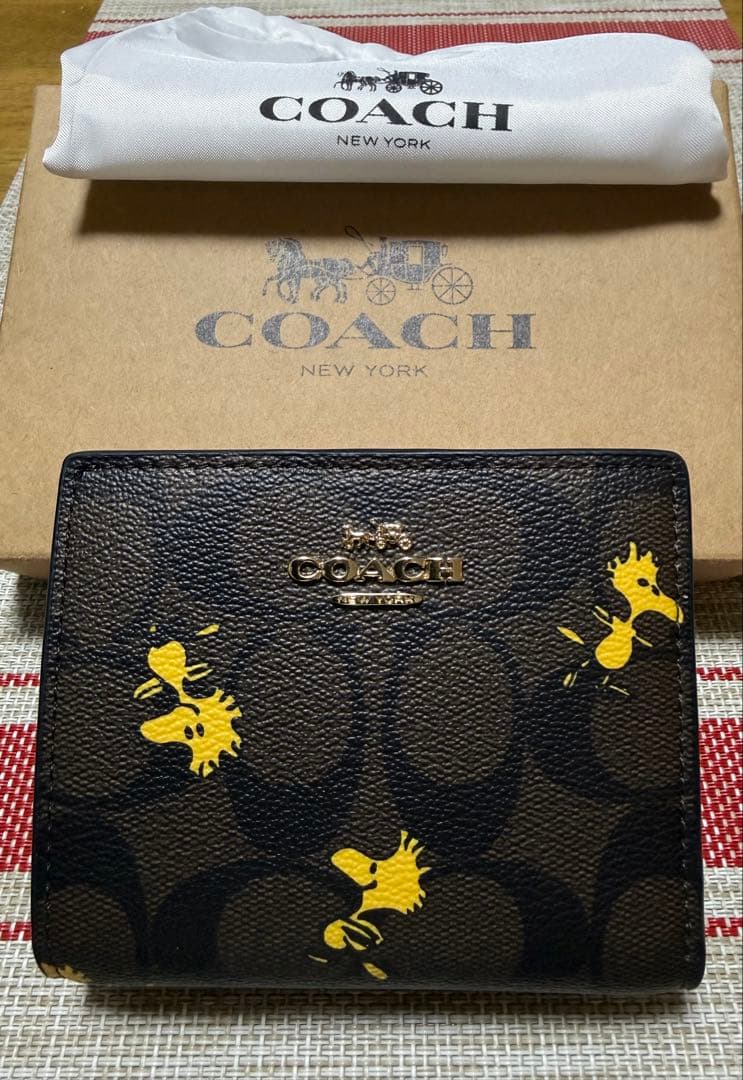 [コーチ] 二つ折り財布 スヌーピーコラボ 未使用