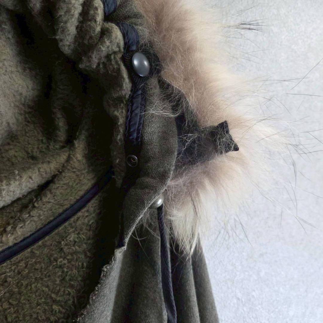 新品 L.G.B. NWT ラクーンファー ポンチョ ケープ フード パーカー