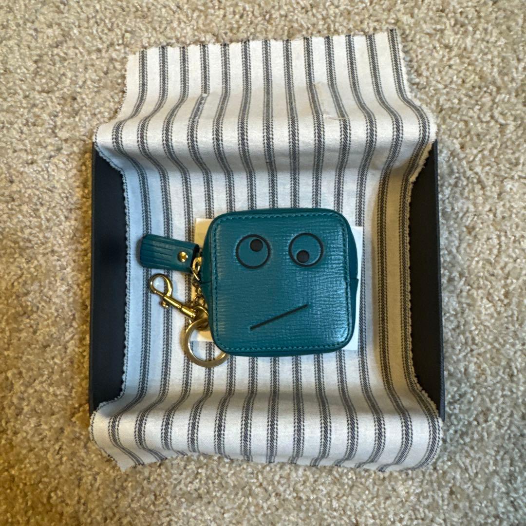 アニヤハインドマーチ 顔デザイン ケース ブルー