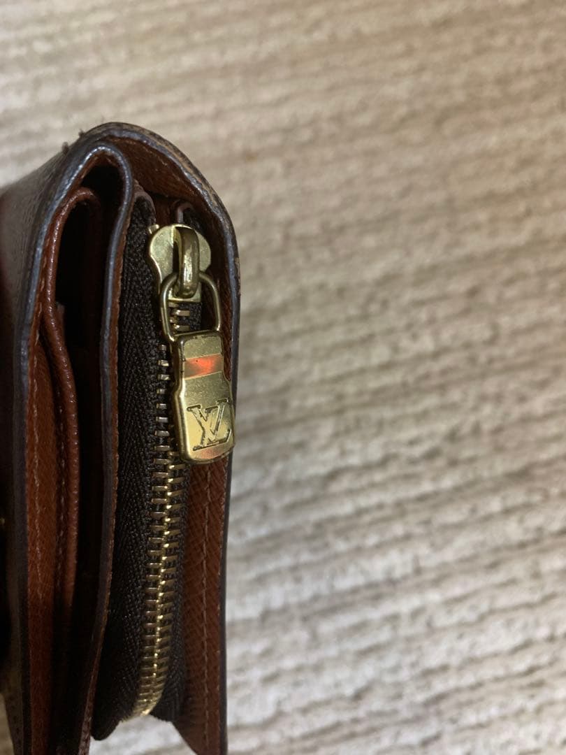 ルイ・ヴィトン 二つ折り財布 ダークブラウン。LOUIS VUITTON 。