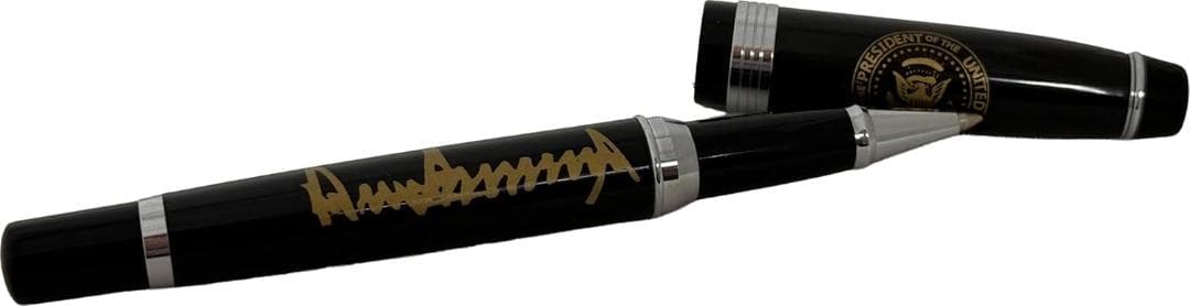 ドナルド・トランプ大統領の署名ペン。黒のボールペン 金色サイン付き