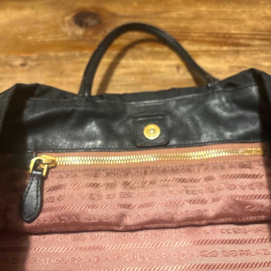 [値下げ] PRADAプラダ リボンバッグ 黒 ナイロン&皮 保証書付き