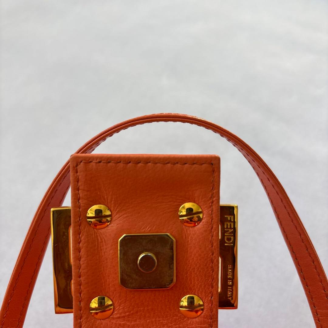 たく FENDIオレンジ ストライプ パーティーバッグ