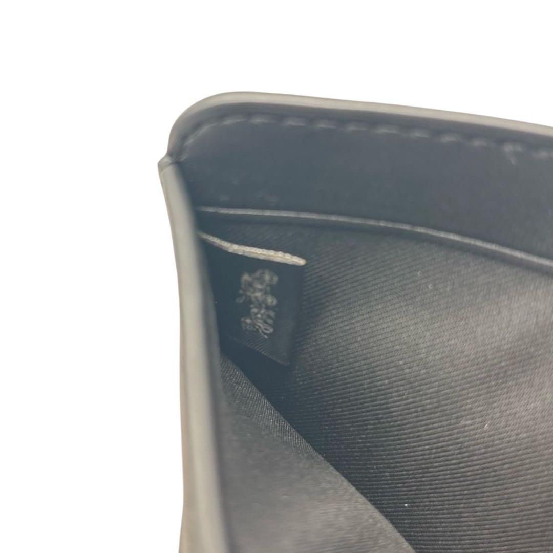 美品◎ YKK刻印あり◎ コーチ レキシー 折り財布 ラウンドジップ 黒 シボ革