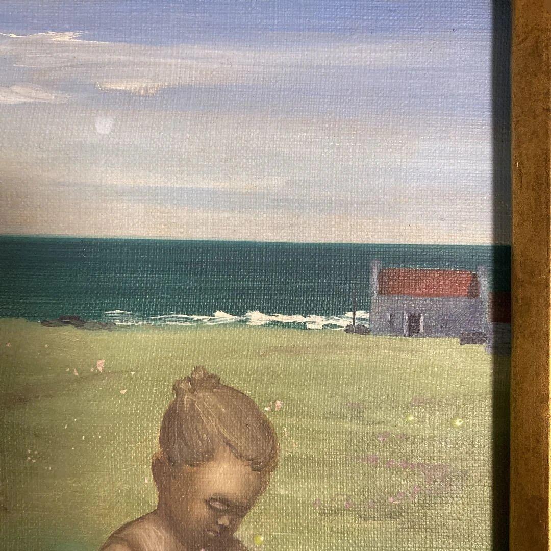 海辺の少女の油彩画
