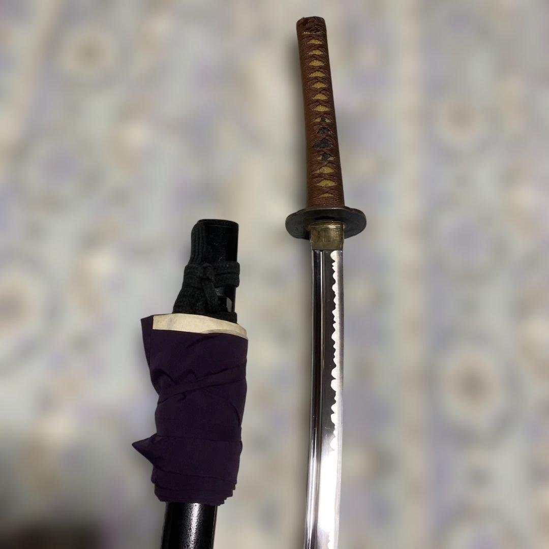 居合刀(刀袋付) 茶柄 竹笹木瓜真鍮鍔 黒梨地呂鞘