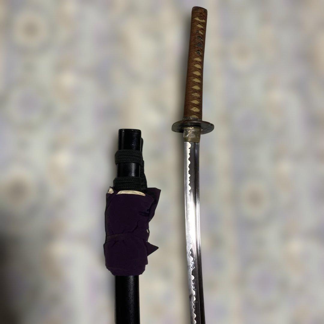 居合刀(刀袋付) 茶柄 竹笹木瓜真鍮鍔 黒梨地呂鞘