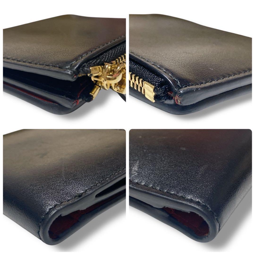 サルバトーレフェラガモ 良品 イタリア製ハラコヴァラリボン 2つ折り財布ブラック