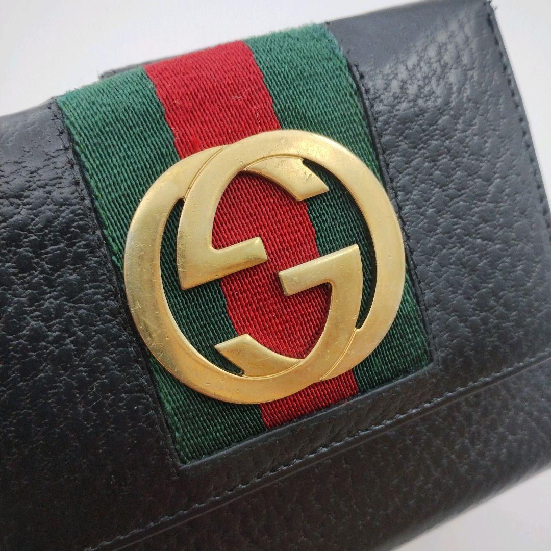 GUCCI 二つ折り財布 インターロッキング シェリーライン GG金具 黒 本革