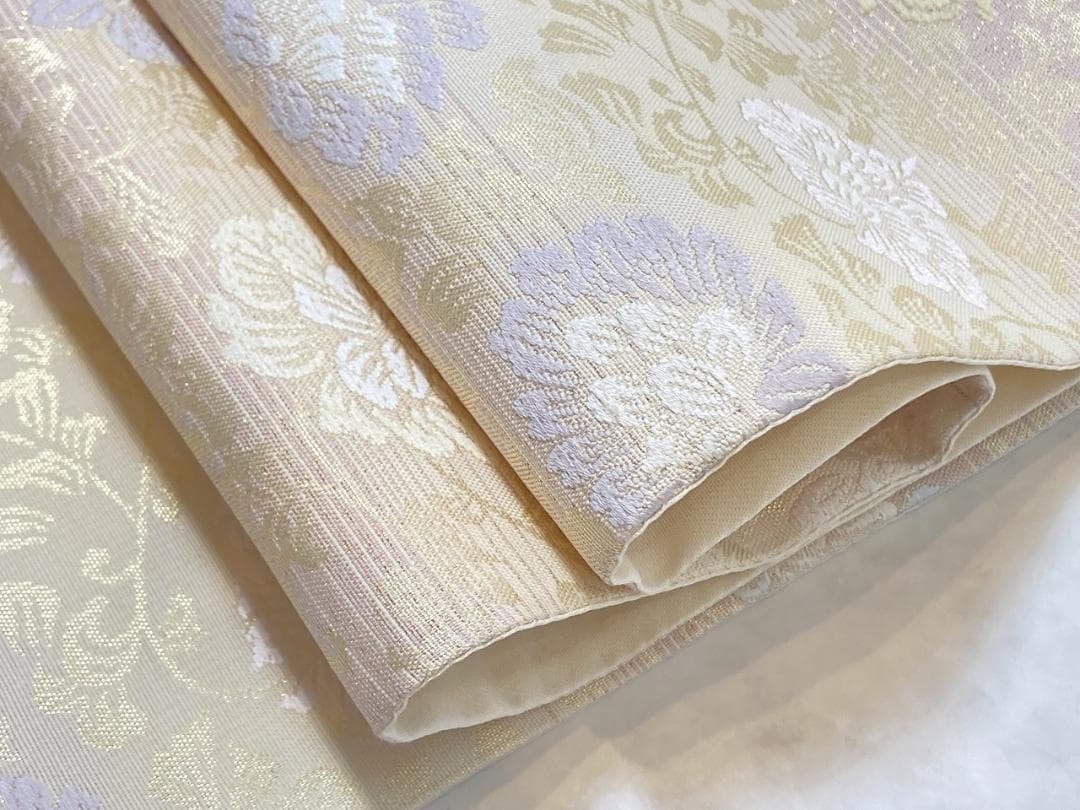 未使用 新小石丸 西陣織 牡丹唐草 袋帯 金 クリーム ピンク 紫 水色 700