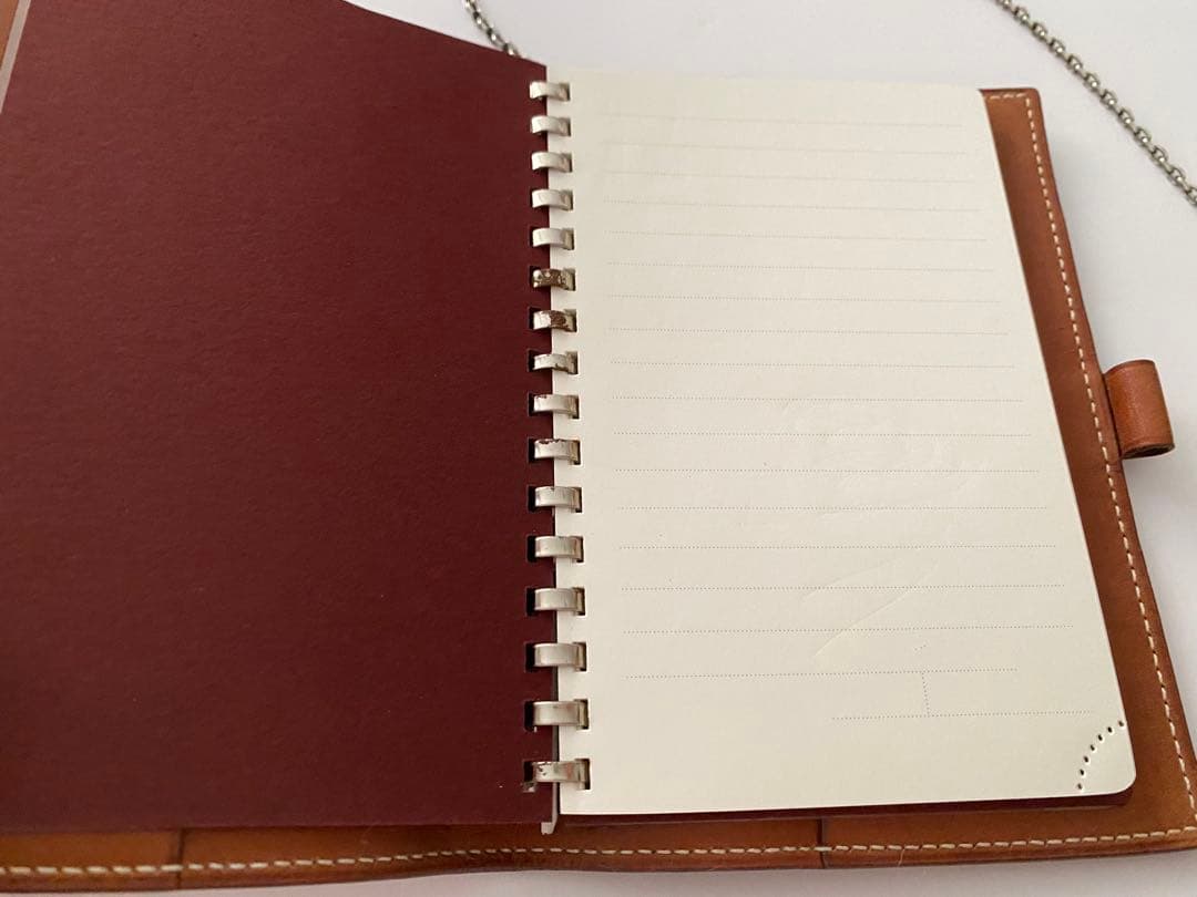 エルメス茶色い革手帳ボールペン付き