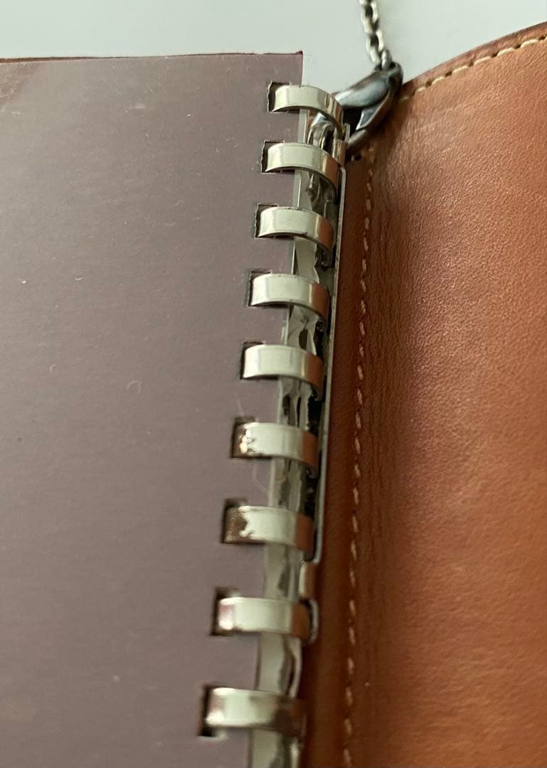 エルメス茶色い革手帳ボールペン付き