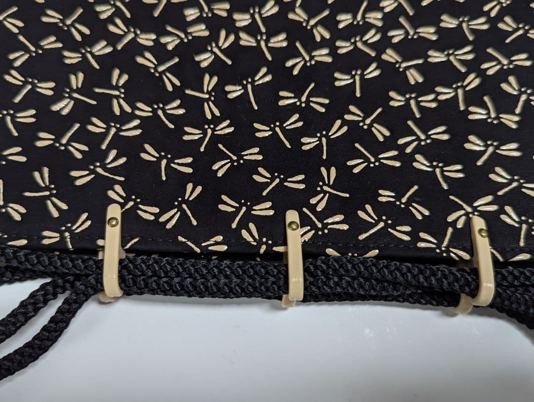 印伝巾着袋 印傳屋上原勇七 INDEN-YA 合切袋 とんぼ 黒地白漆