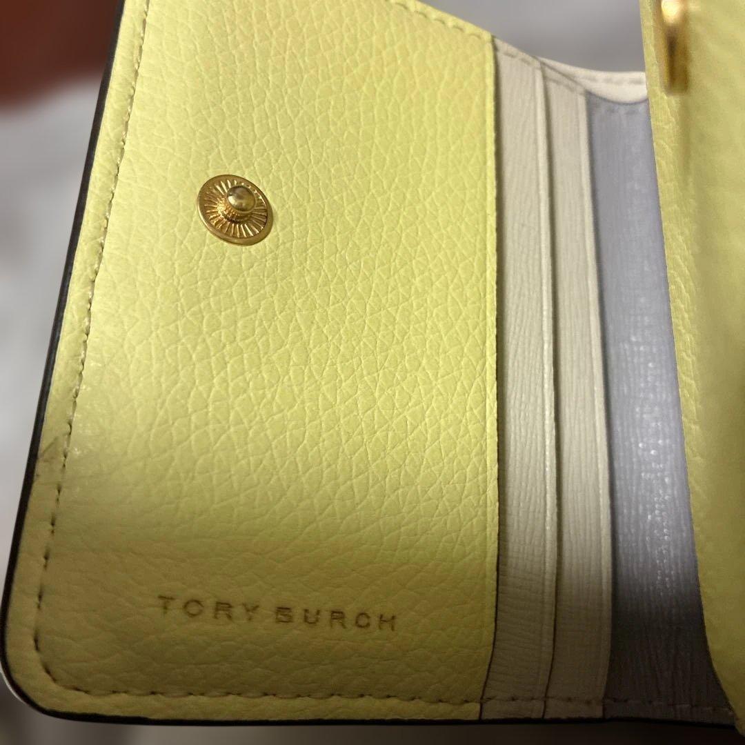 トリーバーチ　イエロー レザー 二つ折り財布