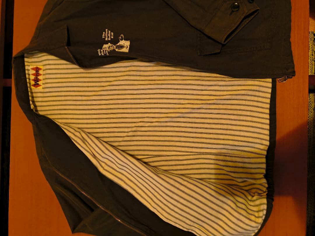 オリーブ色ジャケット THE WEIRDO OH