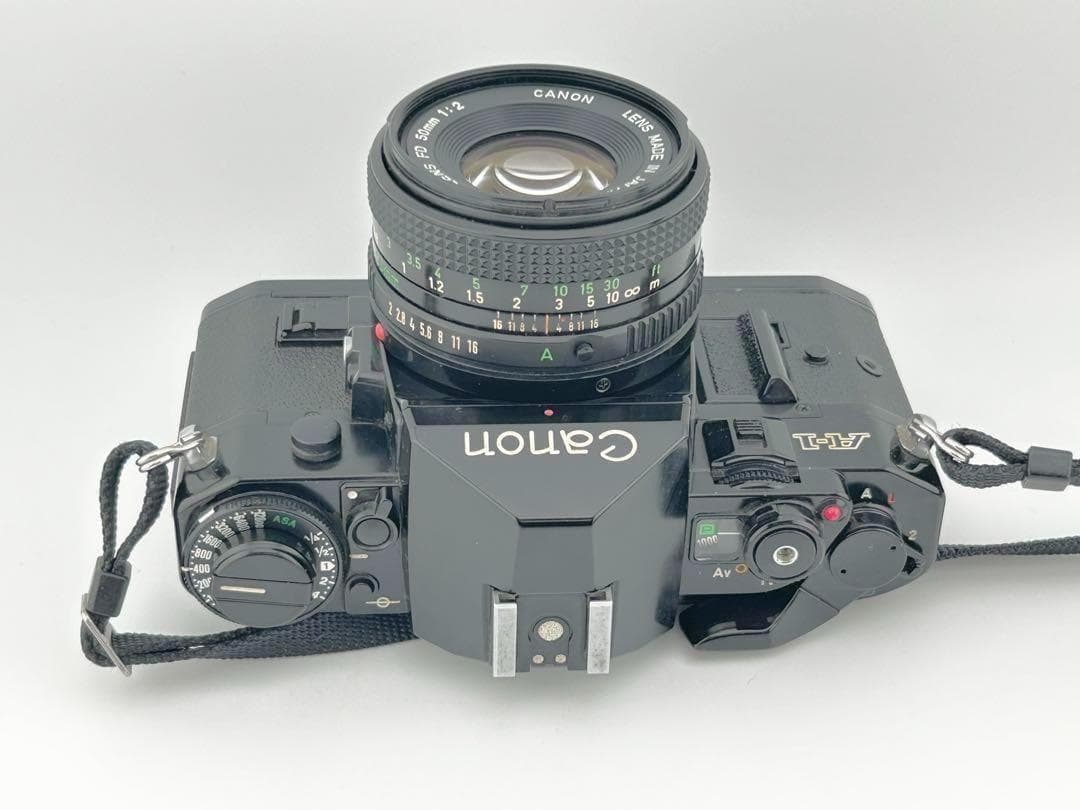 【完動品】　Canon A-1　FD 50mm 1:2 モルト貼替・動作確認済