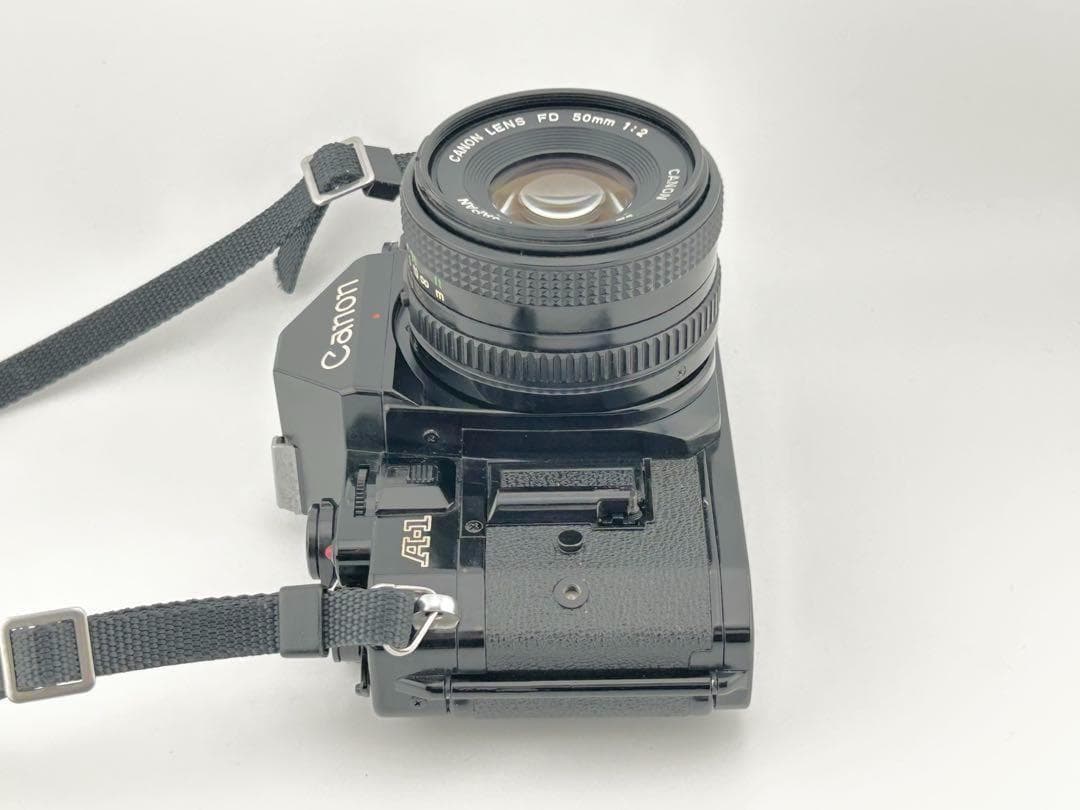 【完動品】　Canon A-1　FD 50mm 1:2 モルト貼替・動作確認済