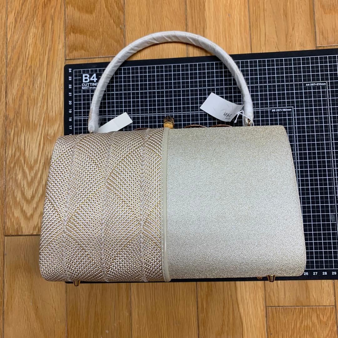 新品未使用　五嶋紐 バッグ　ゴールド系網目模様ハンドバッグ