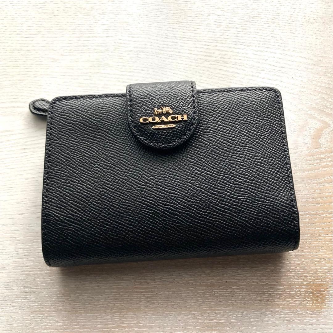 COACH コーチ　2つ折財布黒　ゴールド金具馬車ロゴ