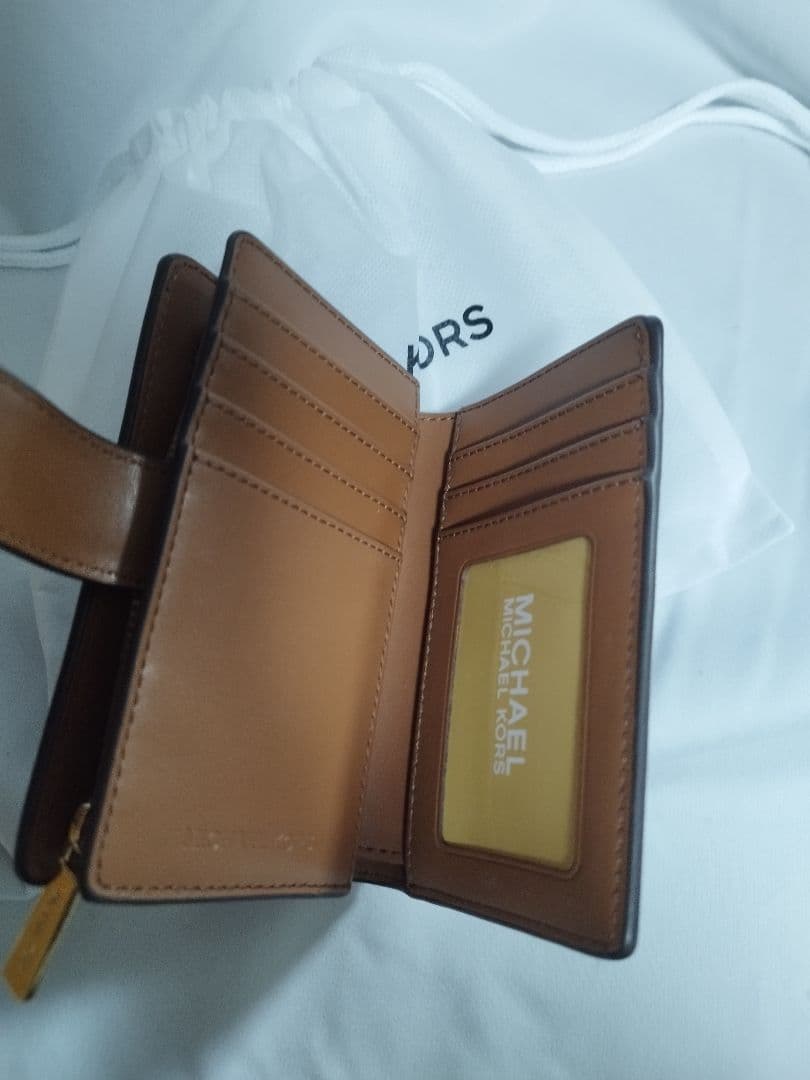 【未使用】MICHAEL KORS マイケルコース 二つ折り財布 シグネチャー