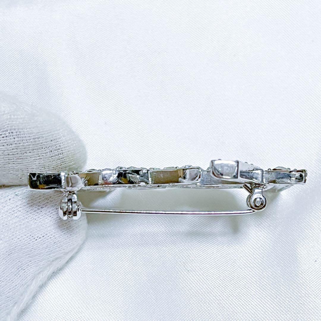 イヴサンローラン ブローチ カサンドラ YSLロゴ　ラインストーン シルバー