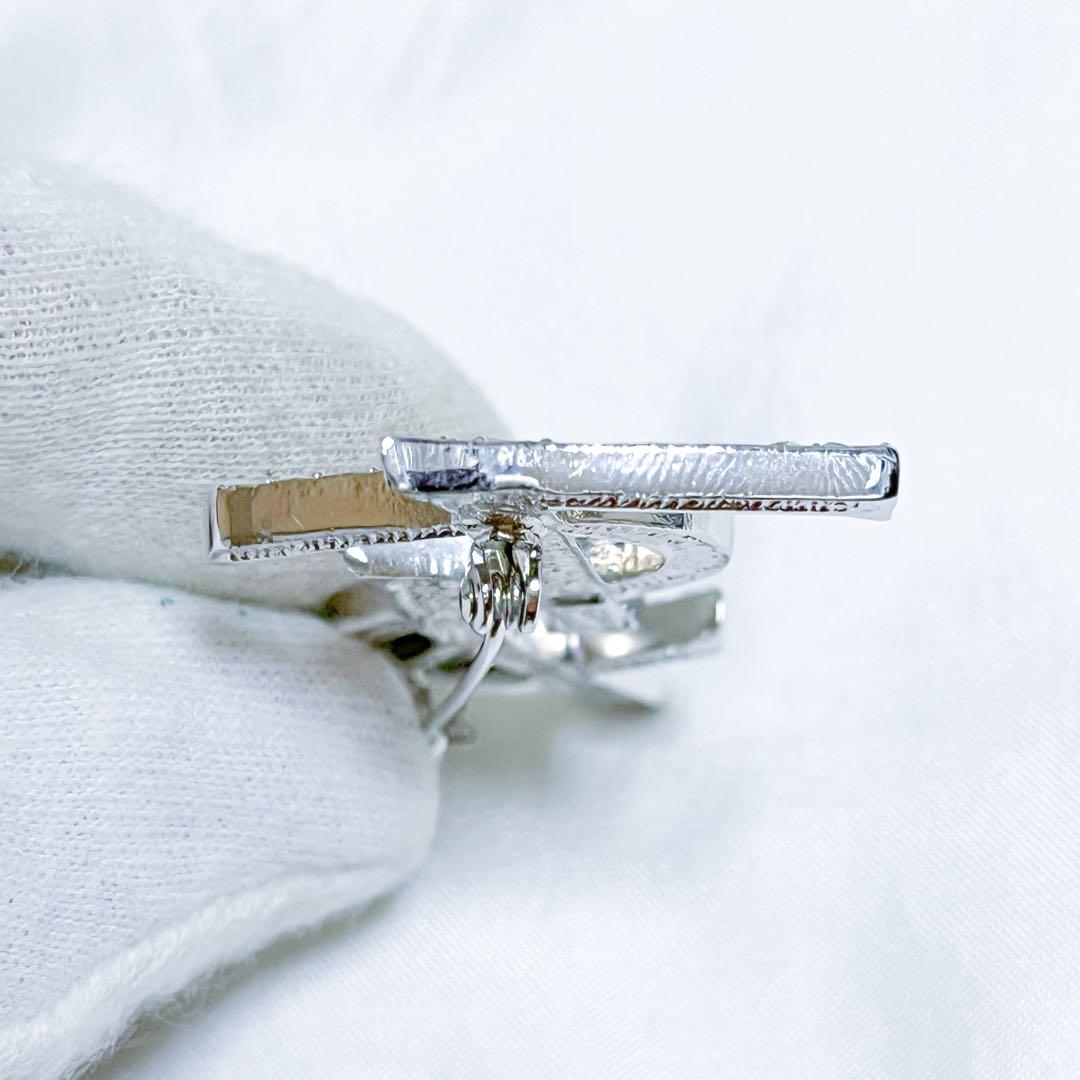 イヴサンローラン ブローチ カサンドラ YSLロゴ　ラインストーン シルバー