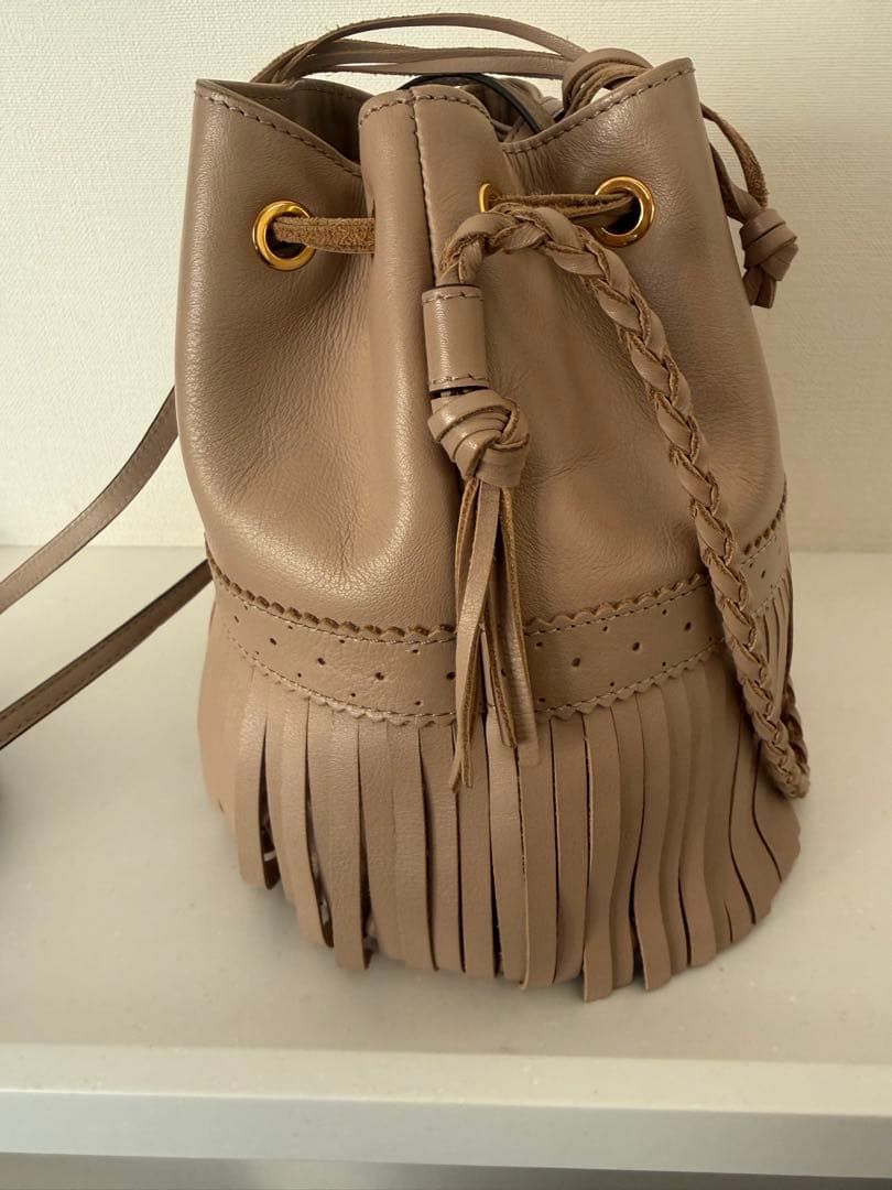 J&M DAVIDSON カーニバル 巾着型 ショルダーバッグ　フリンジ