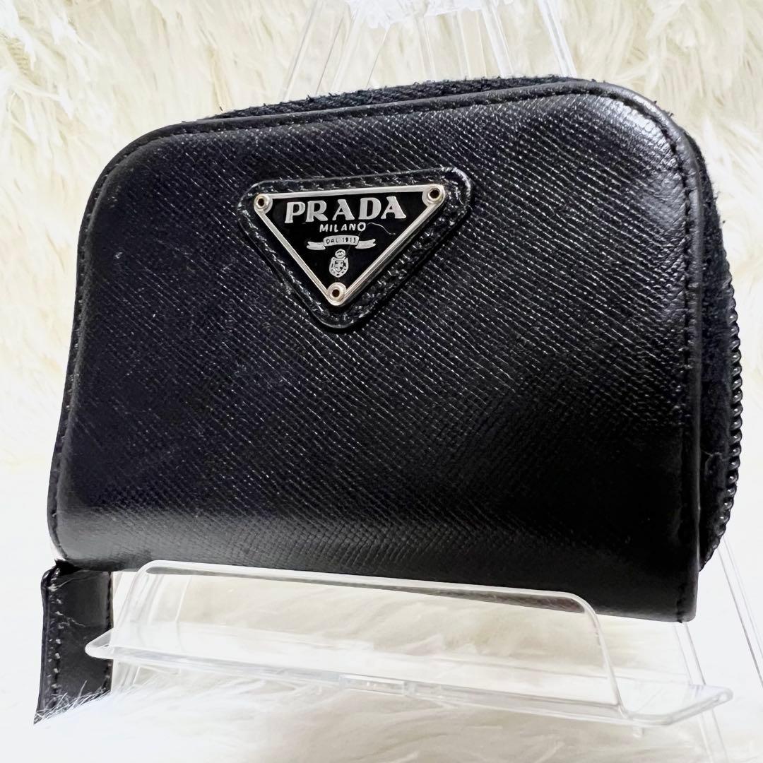 PRADA ケース トライアングルロゴ サフィアーノ 黒 ラウンドジップ