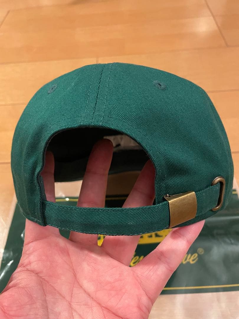 下馬オリーブ Divided States Of Olive キャップ