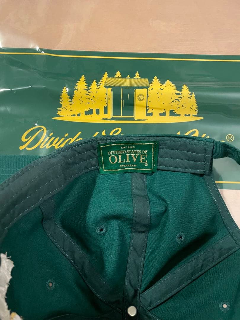 下馬オリーブ Divided States Of Olive キャップ