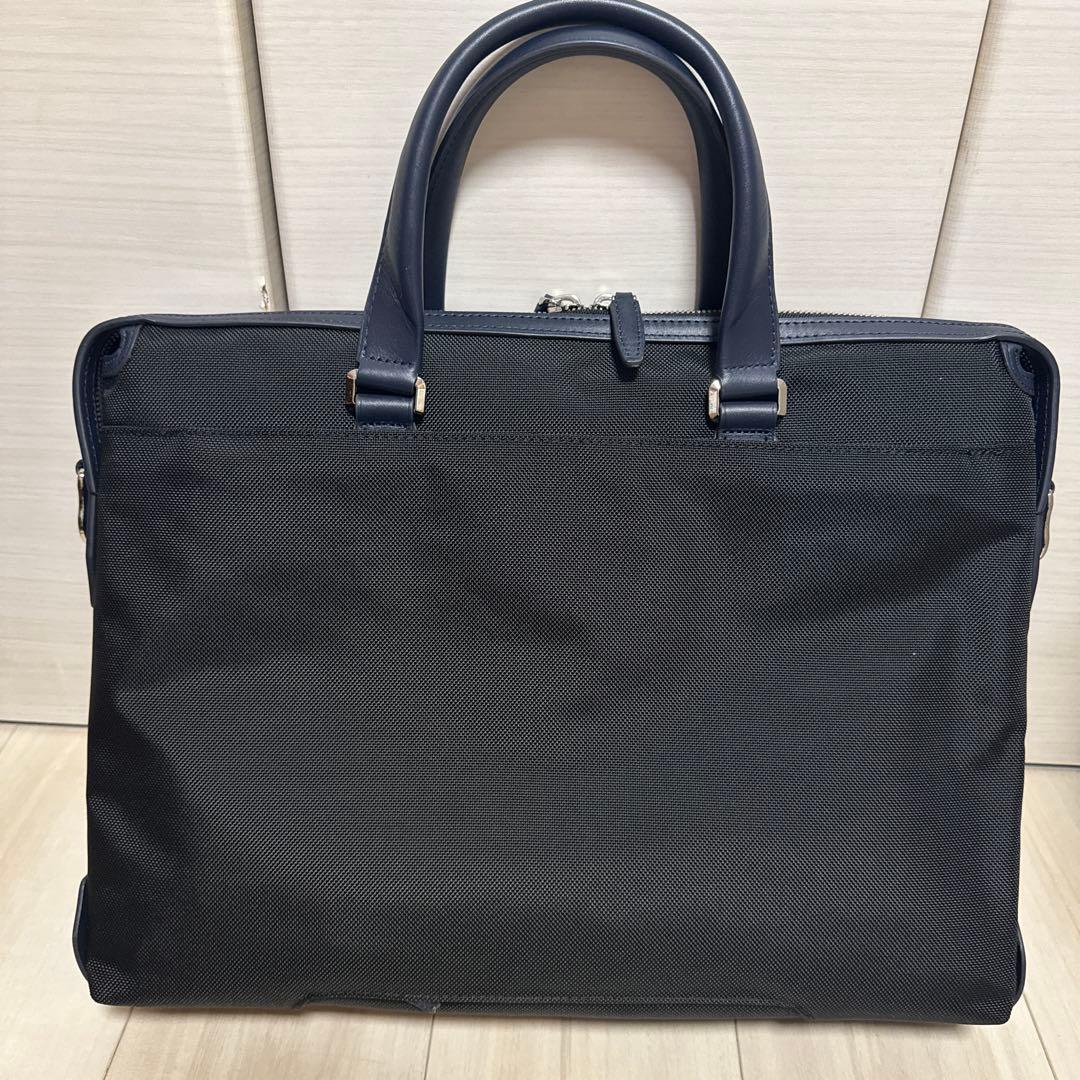 【28年まで保証期間】TUMI JARVIS スリムブリーフ ブラック✕ネイビー