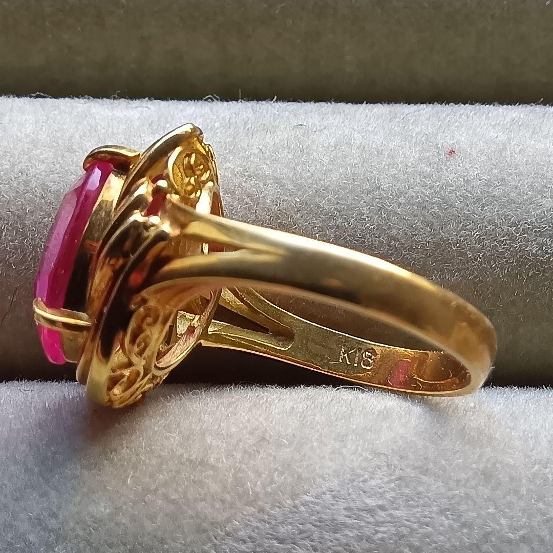 ピンク色おたからや聞くルビーかストーンリングK１８内径約１６mm重量合計４.５g