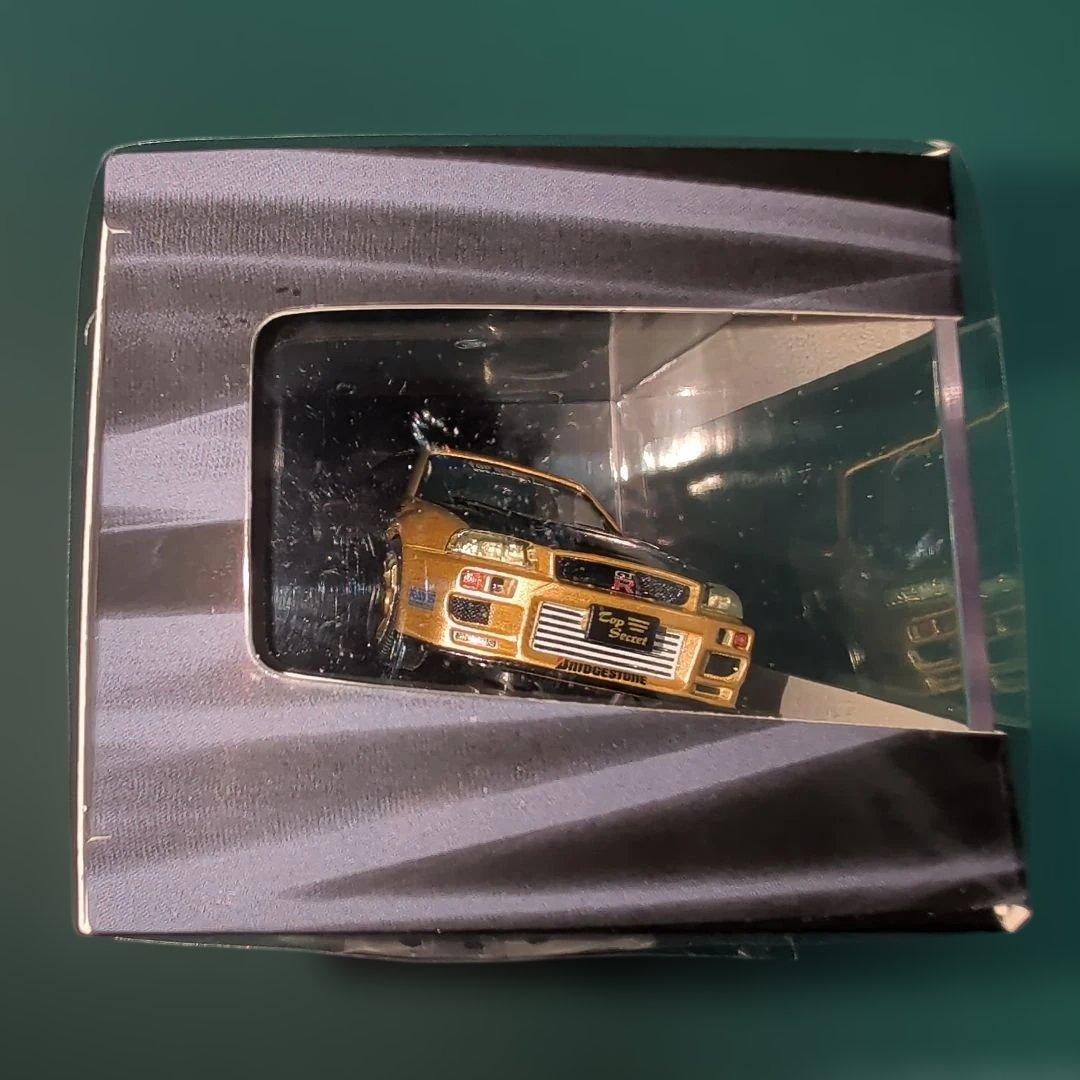 東京オートサロン限定　TOP SECRET　R34 GOLD 1/43