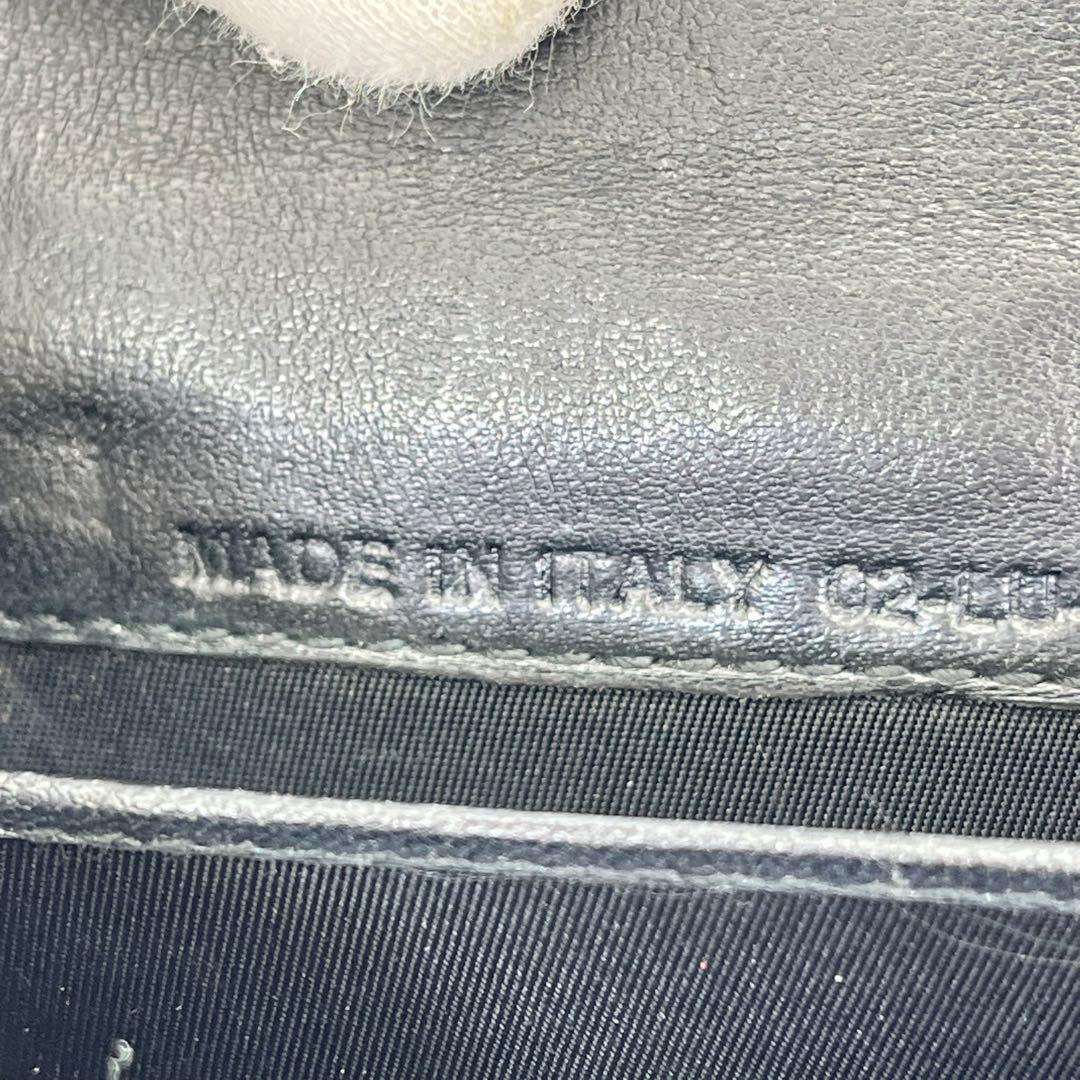 クリスチャンディオール 二つ折り財布 ロゴ金具 エンボス 黒 レザー 男女可能