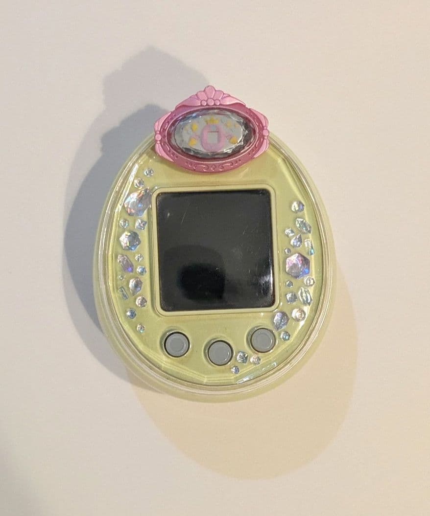 たまごっちp's イエロー たまデコピアスアニバーサリーチェンジ&ストラップ付き