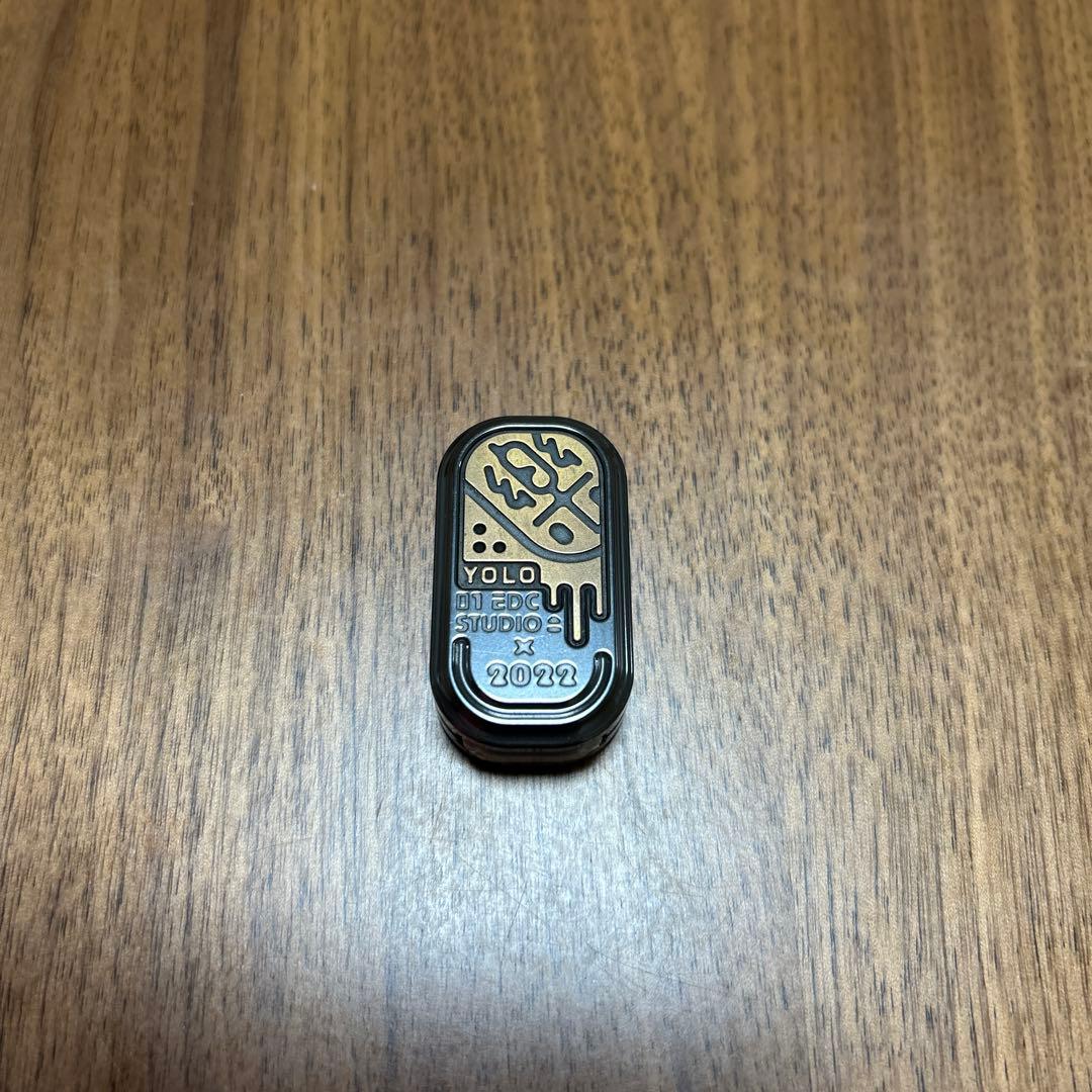 01EDCxYOLO Zirc/Brass Slider フィジェットトイ