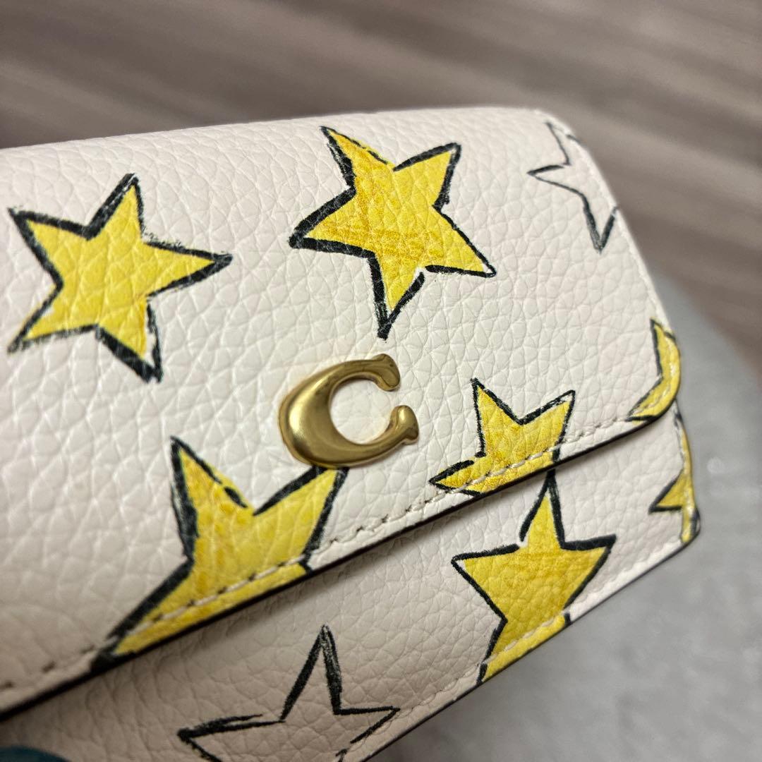 コーチ　エッセンシャル ミニ トライフォールド ウォレット・スター プリント