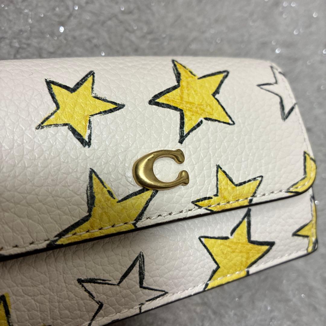 コーチ　エッセンシャル ミニ トライフォールド ウォレット・スター プリント