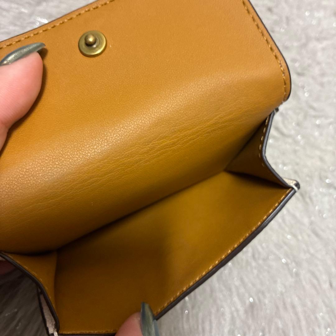 コーチ　エッセンシャル ミニ トライフォールド ウォレット・スター プリント