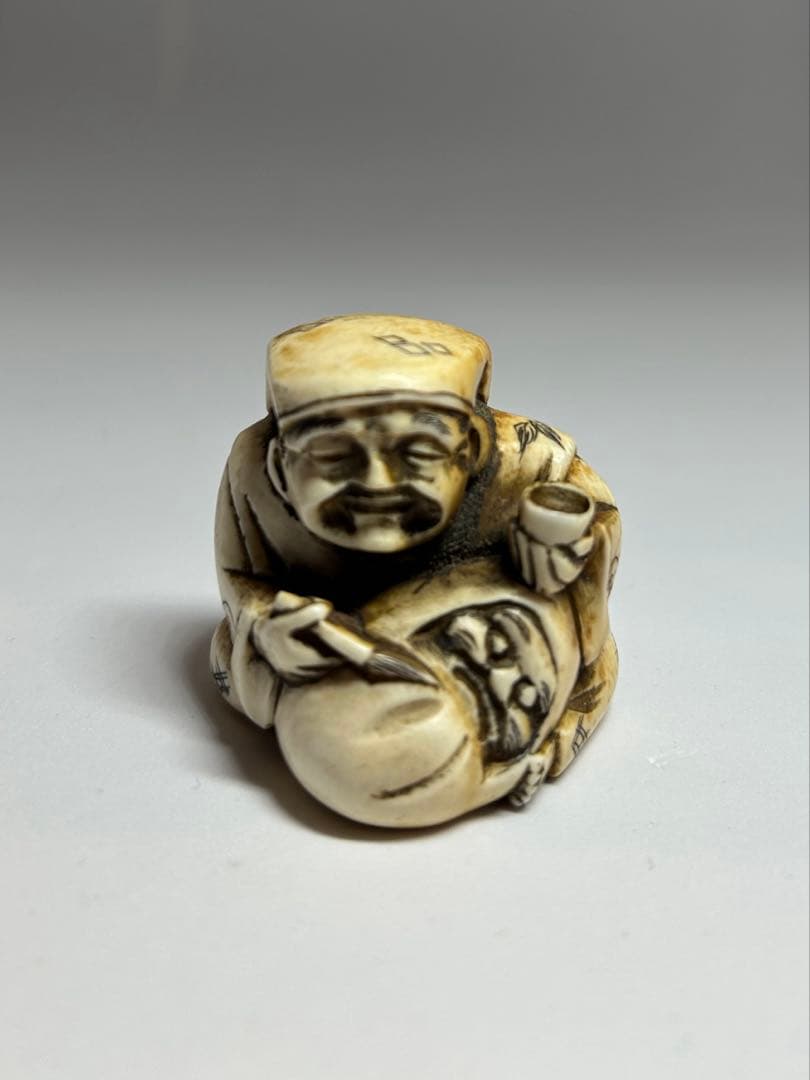 【銘あり】根付 大黒天風 骨 牙 （天然素材） 千広銘　29g