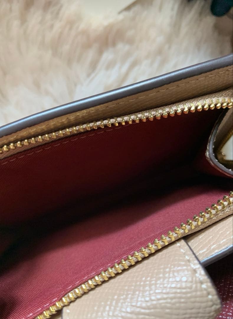 COACH ベージュ 二つ折り財布