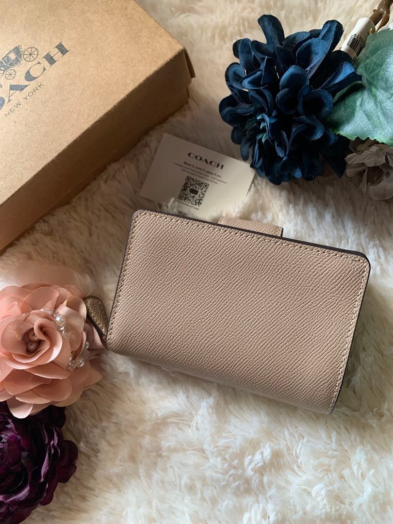 COACH ベージュ 二つ折り財布