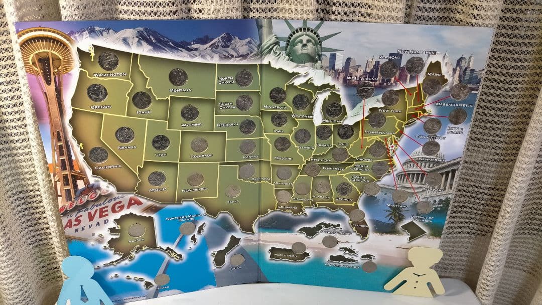 ☆。アメリカ25セントクォーター50州記念アルバム(56枚在中)。